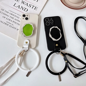 Crossbody iPhone case with adjustable strap and silicone wrist ring in matte finish
