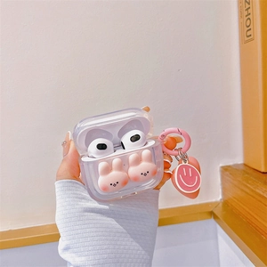 Close-up of clear AirPods 3 case with pink bunny decor, round ring and smiley charm