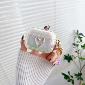 Detailed view of laser silicone AirPods case with 3D heart and gradient ribbon