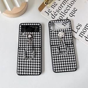 Custodia Samsung Galaxy Z Flip pied-de-poule con fiore camelia e anello strass