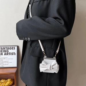 White litchi pattern leather crossbody phone bag with large bow and gold metal hooks