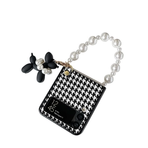 Houndstooth Samsung Z Flip case with pearl handle and black balloon dog charm decoration