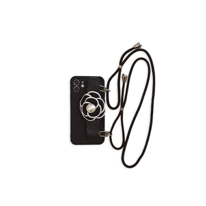 Black iPhone case with crossbody strap, camellia flower and pearl wristband accessory