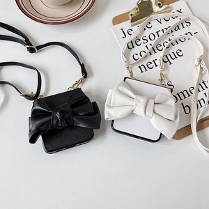 Detail of luxury Galaxy Z Flip case with large leather bow and crossbody strap
