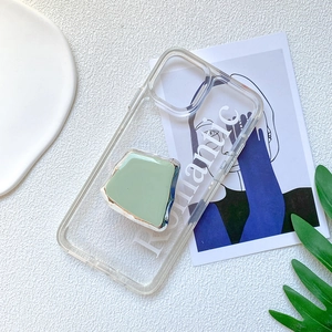 Glossy mint green square folding grip on a transparent phone case with Romantic text