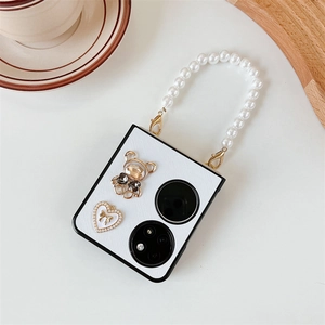 Detail of white textured folding phone case with pearl handle and heart pendant for P50 Pocket