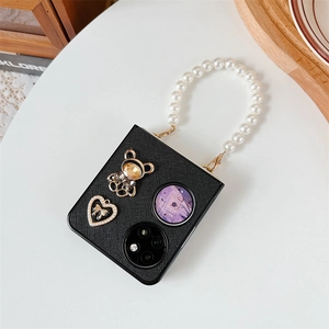 Detail of black leather fold case for Huawei P50 Pocket with pearl chain and bear charm