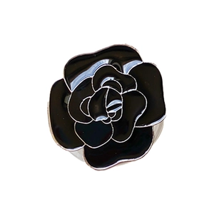 Elegant black camellia flower phone grip with metallic silver plating and secure mount