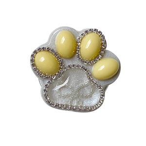 Cute cat paw phone socket holder with glitter finish and yellow rhinestones
