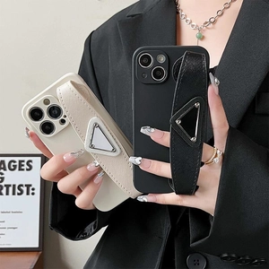 Luxury iPhone case with Saffiano leather hand strap and iconic triangle metal emblem