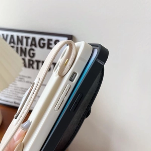 Close-up of premium leather texture phone case with wrist strap and precise button cutouts