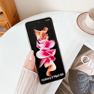 Detail of clear split case for Samsung Galaxy Z Flip3 showing foldable design