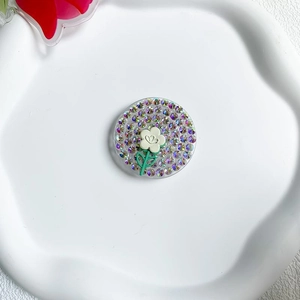 Macro detail of tulip flower cell phone grip holder with iridescent AB rhinestones