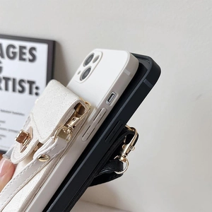 Detail of lychee leather phone case with integrated card holder and metal swivel lock