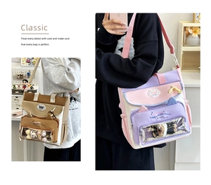 Detail of trendy tote bags with cat-ear pockets and transparent windows for plushies
