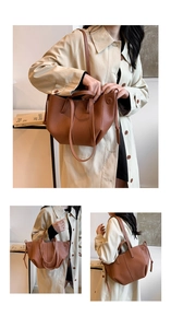 Detailansicht der braunen Leder-Tragetasche mit einzigartigem Falt-Design und Maserung