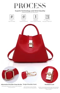 Macro shot of red lychee grain PU leather bag with gold hardware buckle and chain