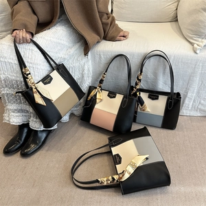Women's large-capacity color-block tote bags with elegant printed silk scarf handle detail
