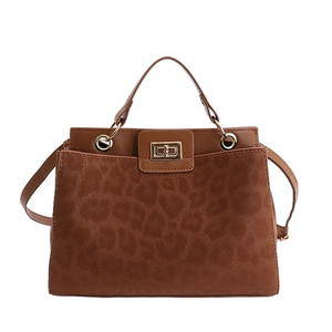 Brown leopard print leopard satchel with gold twist lock and adjustable shoulder strap