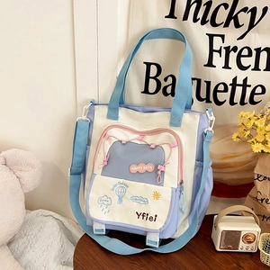 Colorful contrast canvas tote bag with Happy Days embroidery and adjustable shoulder strap