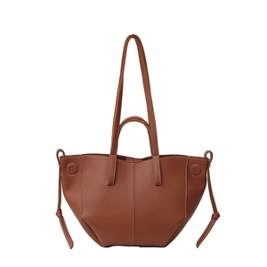 Caramel lychee grain leather tote bag with petal stitched base and contrast stitching
