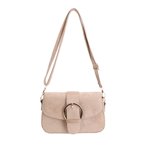 Elegant beige suede crossbody bag with a large gold circular buckle and adjustable strap