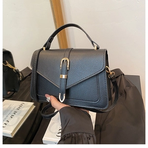 Classic black pebble grain leather satchel bag with retro golden U-shaped metal buckle