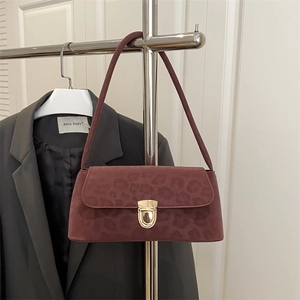 Dark red leopard print small square bag with gold buckle and faux suede finish