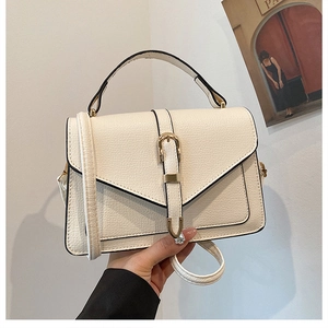 Vintage cream white flap handbag with lychee pattern leather and gold buckle strap
