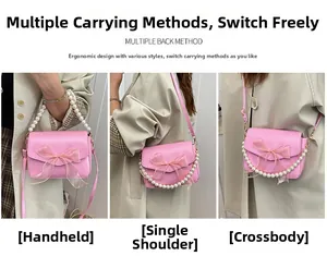 Detailed view of pink pearl chain bag showing handbag, shoulder, and crossbody styles