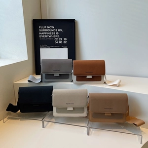 Minimalist matte crossbody bags with wide fabric straps in five trendy colors