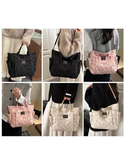 Collage of embossed canvas tote bags in black pink and white showing various carrying styles