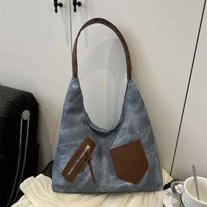 Vintage Hobo-Tasche aus Segeltuch mit braunen Ledertaschen und Schultergurt in Freizeitoptik