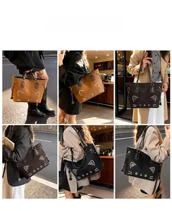 Lifestyle view showing cat pattern tote bag in brown and black on a street model