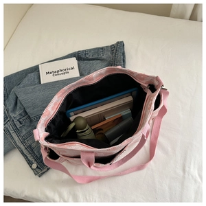 Pink printed tote bag interior showing ample space for tablets, books, and daily essentials