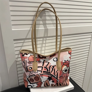 Graffiti canvas tote bag with pink and white street art design and leather straps