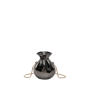 Glossy gunmetal drawstring bucket bag with gold chain strap on white background