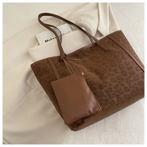 Detail of leopard print suede tote bag set with a matching detachable zipper pouch