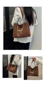 Detail of leopard print tote bag featuring elegant pearl and gold chain strap accents