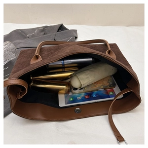 Top view of coffee brown tote bag showing large capacity for tablet and daily items