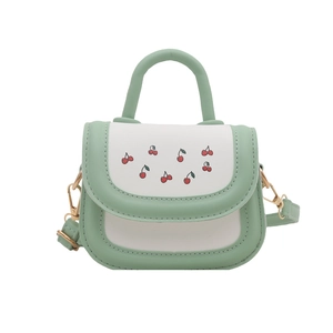 Mini mint green and white cherry print handbag with detachable shoulder strap