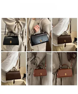 Detail showing high-quality vintage shoulder bags with elegant gold CD metal buckles