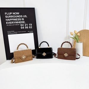 Three minimalist crossbody square bags in khaki, black, and reddish brown with floral buckles