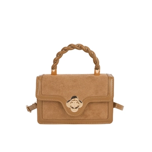 Brown patchwork handbag with suede texture, woven handle and gold flower clasp