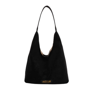 Minimalist black hobo tote bag in suede finish with golden logo and spacious interior