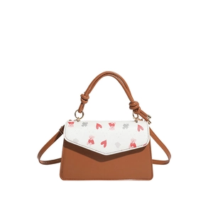 Brown and white crossbody bag with heart and bear prints, minimalist small square shape