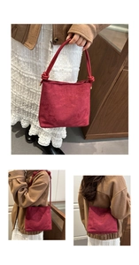 Macro shot of burgundy bucket bag with knotted handle and fashion engraving details