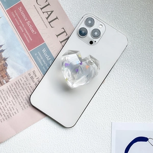 Transparent heart phone grip with diamond cut texture and colorful inner charms