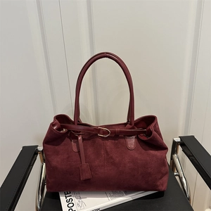 Vintage burgundy suede tote bag with large capacity and elegant metallic buckle detail