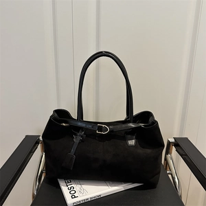 Vintage large capacity black tote bag with matte texture and sleek leather handles